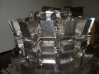 Used Ishida 16 Head Multi-Purpose Weigher, Model CCW-Z-216B-D/30-WP, Stainless Steel Contact Parts. Designed for different weights of up to four products simultaneously, for discharge into the same p...