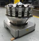 Used Ishida 16 Head Computer Weigher, Model CCW-Z-216W-S/20-WP, Serial 19102, Year 1992.  208 Volt, 60 hz, 10.9 amps, stainless steel contact parts.  Smooth buckets.