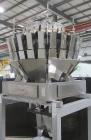 Used Ohlson Model MHW24F 24 Head Combination Scale. Stainless steel construction. Approximate 1.3 liter smooth buckets. Approximate maximum speeds up to 240 bags/min. Approximate weight range 15 - 30...