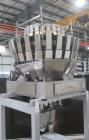 Used Ohlson Model MHW24F 24 Head Combination Scale. Stainless steel construction. Approximate 1.3 liter smooth buckets. Approximate maximum speeds up to 240 bags/min. Approximate weight range 15 - 30...