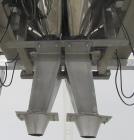 Used Ohlson Model MHW24F 24 Head Combination Scale. Stainless steel construction. Approximate 1.3 liter smooth buckets. Approximate maximum speeds up to 240 bags/min. Approximate weight range 15 - 30...