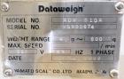 Used Yamato Scale Model ADW-510-A, 10 Head Scale with 3 liter buckets. Maximum speed up to 70 per minute. Weight range 4 - 500 gram. Serial# WG980674. 1/60/230 Volt.