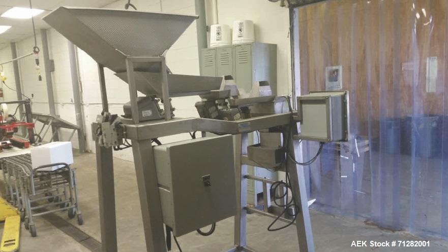 Used Inspired Automation Packaging Systems Weigh Fill Machine. Syntron Magnetic Feeder - Model F-010-B. Manufactured 2001.