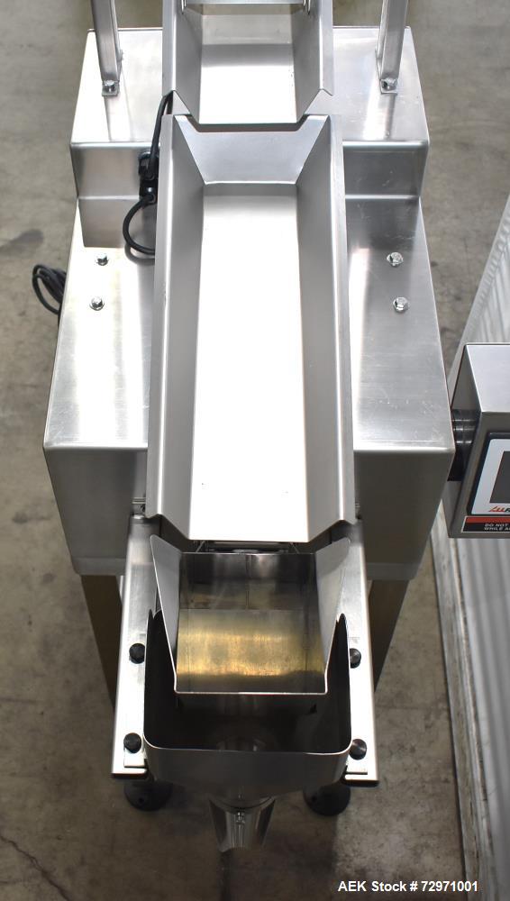 Used All-Fill VF-110-ST Single Lane Vibratory Filler. Capable of speeds up to approximate 8 CPM. Hopper, approximate 16" x 16" x 12.5" deep. (1) FMC vibratory feeder, approximate 4" w x 12" l x 2" de...