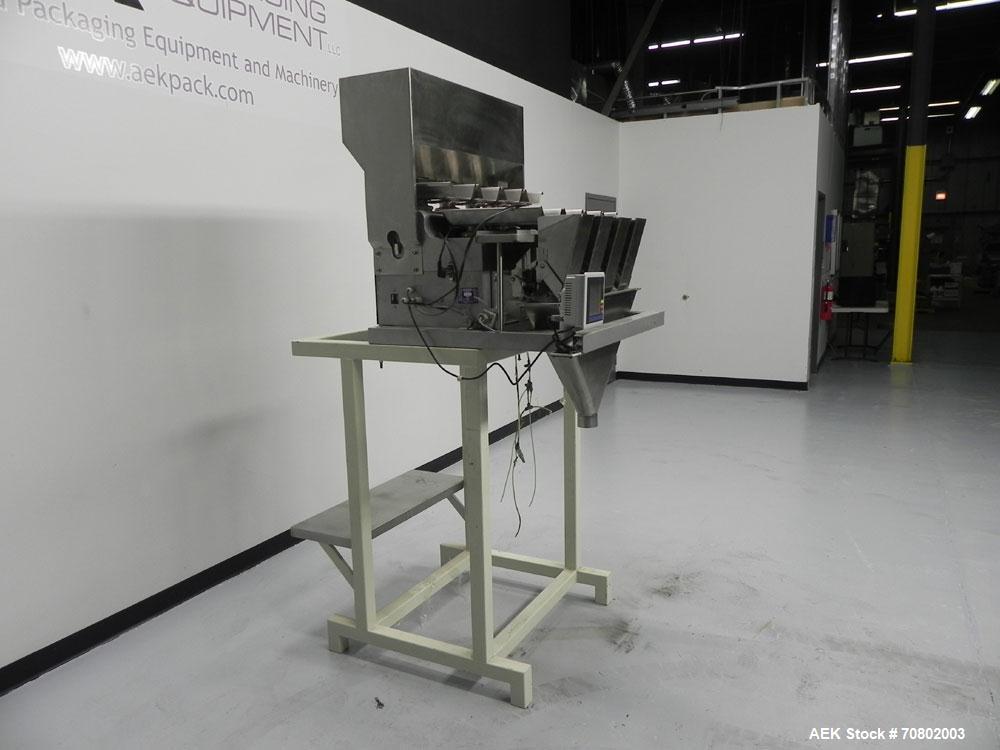 Used 4-Bucket Linear Scale System. Not operational.