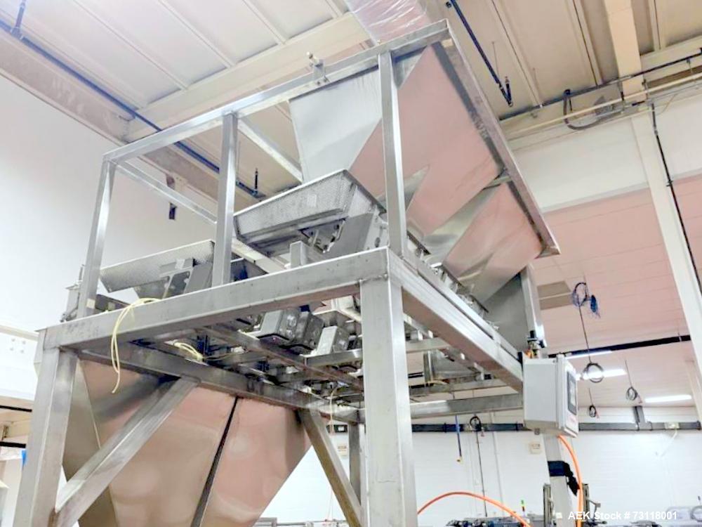 Tridyne Process Systems Automatic Vibratory Feeder & Net-weighing System