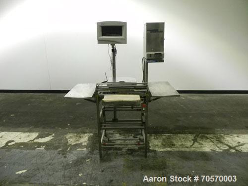 Used Mettler-Toledo Model 662 StepSaver Manual Weigh-Wrap Center. Consists of a SmartTouch Readout, model 8270 scale, stainless steel platform, capacity 50 x .01 pounds, model 317 label printer, labe...