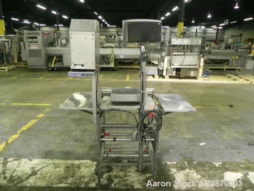 Used Mettler-Toledo Model 662 StepSaver Manual Weigh-Wrap Center. Consists of a SmartTouch Readout, model 8270 scale, stainless steel platform, capacity 50 x .01 pounds, model 317 label printer, labe...