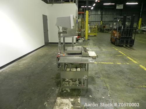 Used Mettler-Toledo Model 662 StepSaver Manual Weigh-Wrap Center. Consists of a SmartTouch Readout, model 8270 scale, stainless steel platform, capacity 50 x .01 pounds, model 317 label printer, labe...