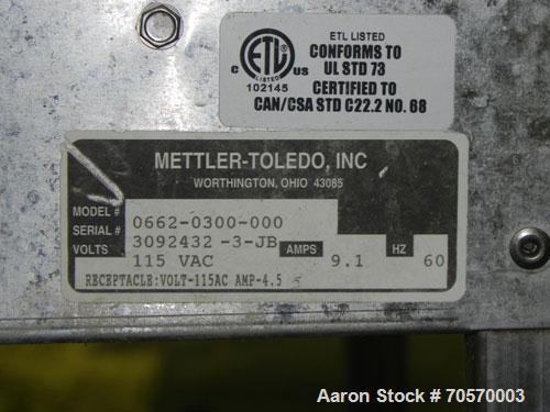 Used Mettler-Toledo Model 662 StepSaver Manual Weigh-Wrap Center. Consists of a SmartTouch Readout, model 8270 scale, stainless steel platform, capacity 50 x .01 pounds, model 317 label printer, labe...