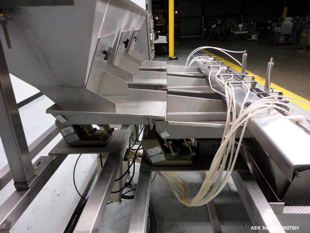Used Weigh Right PMB-3 Net Weigh Scale System. Capable of speeds up to 45 containers per minute (Depending on product and fill volume). Fill volume range: 3 - 10 lbs, with accuracy of 0 - 0.01 lbs. (...