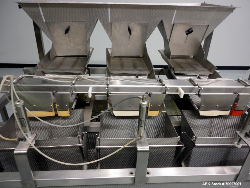 Used Weigh Right PMB-3 Net Weigh Scale System. Capable of speeds up to 45 containers per minute (Depending on product and fill volume). Fill volume range: 3 - 10 lbs, with accuracy of 0 - 0.01 lbs. (...