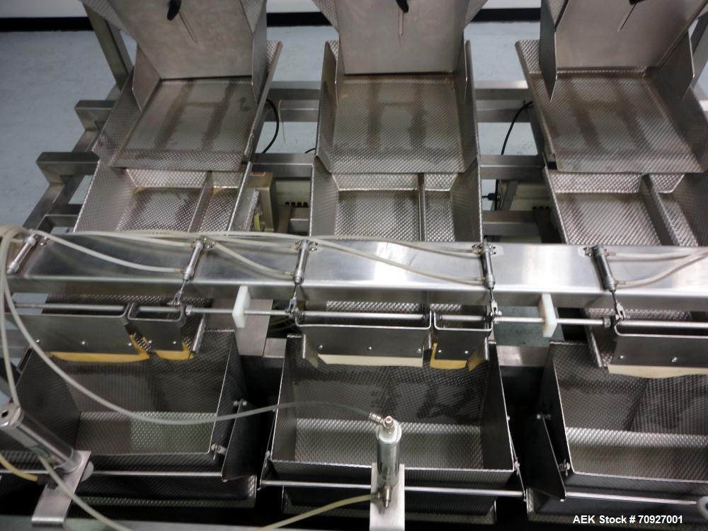 Used Weigh Right PMB-3 Net Weigh Scale System. Capable of speeds up to 45 containers per minute (Depending on product and fill volume). Fill volume range: 3 - 10 lbs, with accuracy of 0 - 0.01 lbs. (...