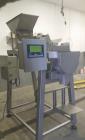 Used Inspired Automation Packaging Systems Weigh Fill Machine. Syntron Magnetic Feeder - Model F-010-B. Manufactured 2001.