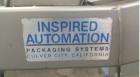 Used Inspired Automation Packaging Systems Weigh Fill Machine. Syntron Magnetic Feeder - Model F-010-B. Manufactured 2001.