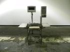 Used Mettler-Toledo Model 662 StepSaver Manual Weigh-Wrap Center. Consists of a SmartTouch Readout, model 8270 scale, stainless steel platform, capacity 50 x .01 pounds, model 317 label printer, labe...
