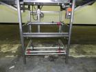 Used Mettler-Toledo Model 662 StepSaver Manual Weigh-Wrap Center. Consists of a SmartTouch Readout, model 8270 scale, stainless steel platform, capacity 50 x .01 pounds, model 317 label printer, labe...