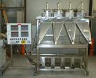 Used Weigh Right PMB-4 net weigher is a four-head scale offering speeds up to 40 fills per minute. Approximately 3-1/2