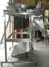 Used Weigh Right PMB-4 net weigher is a four-head scale offering speeds up to 40 fills per minute. Approximately 3-1/2