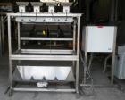 Used Weigh Right PMB-4 net weigher is a four-head scale offering speeds up to 40 fills per minute. Approximately 3-1/2
