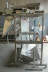 Used Weigh Right PMB-4 net weigher is a four-head scale offering speeds up to 40 fills per minute. Approximately 3-1/2