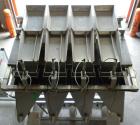 Used Weigh Right PMB-4 net weigher is a four-head scale offering speeds up to 40 fills per minute. Approximately 3-1/2