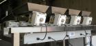Used Weigh Right PMB-4 net weigher is a four-head scale offering speeds up to 40 fills per minute. Approximately 3-1/2