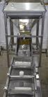 Used- Weigh Right Model IQ-SHUTTLE SP Linear Bulk Dribble Scale. Infeed hopper with Syntron model BF-2-B magnetic feeder. Fe...