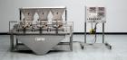 Used- Weigh Right PMB-3 Net Weigh Scale System. Capable of speeds up to 45 containers per minute (Depending on product and f...