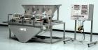 Used Weigh Right PMB-3 Net Weigh Scale System. Capable of speeds up to 45 containers per minute (Depending on product and fill volume). Fill volume range: 3 - 10 lbs, with accuracy of 0 - 0.01 lbs. (...