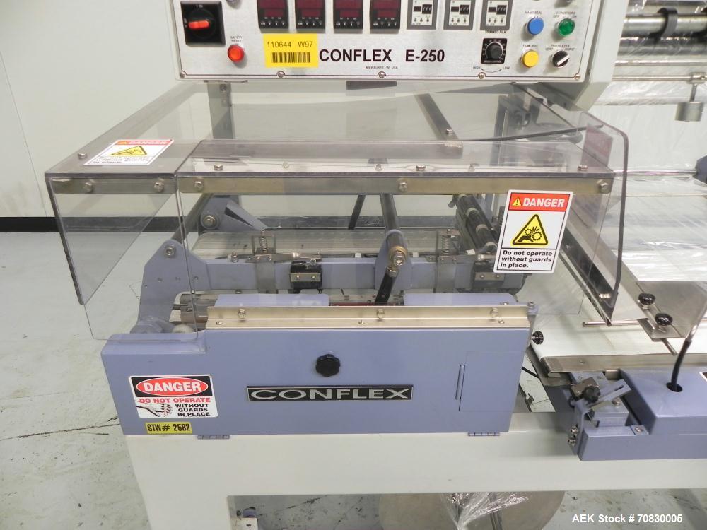 Used Conflex Model E-250 HS Automatic L Bar Sealer and Shrink Wrapper. The model E-250 HS is capable of speeds up to 35 packages per minute. Seal bar is 17" wide x 22" long with max height of 5". Has...