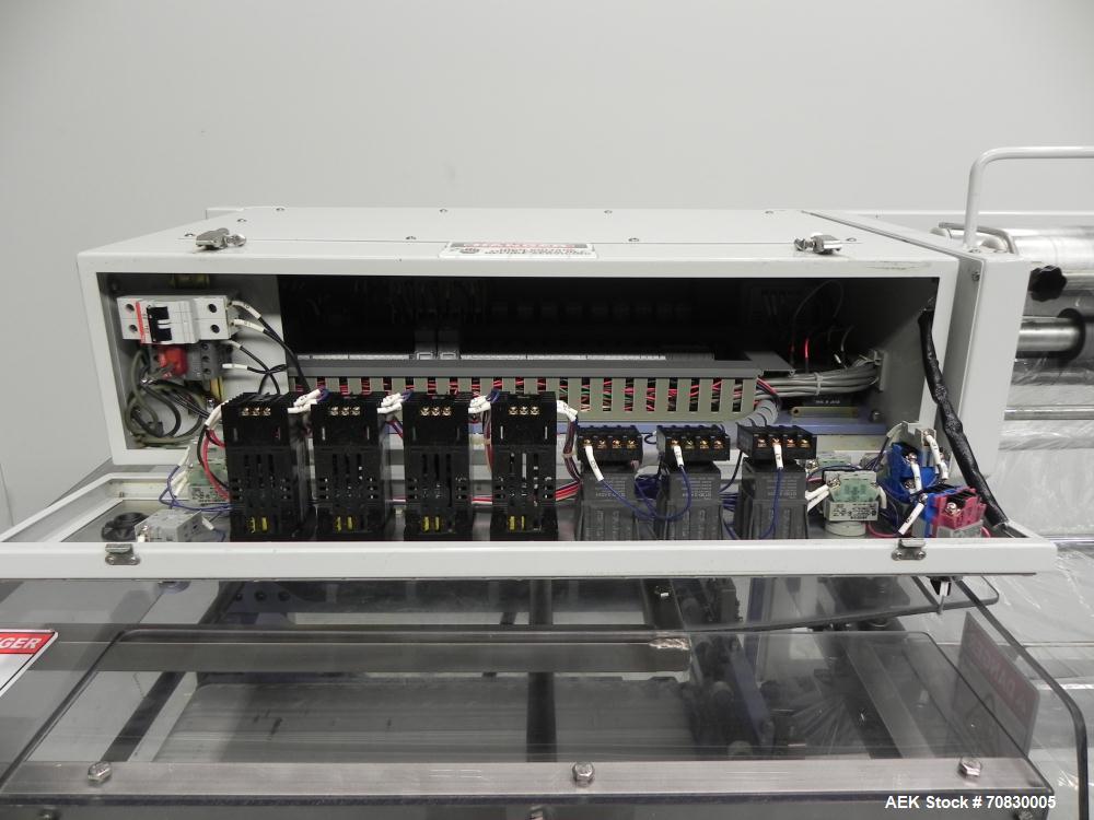 Used Conflex Model E-250 HS Automatic L Bar Sealer and Shrink Wrapper. The model E-250 HS is capable of speeds up to 35 packages per minute. Seal bar is 17" wide x 22" long with max height of 5". Has...