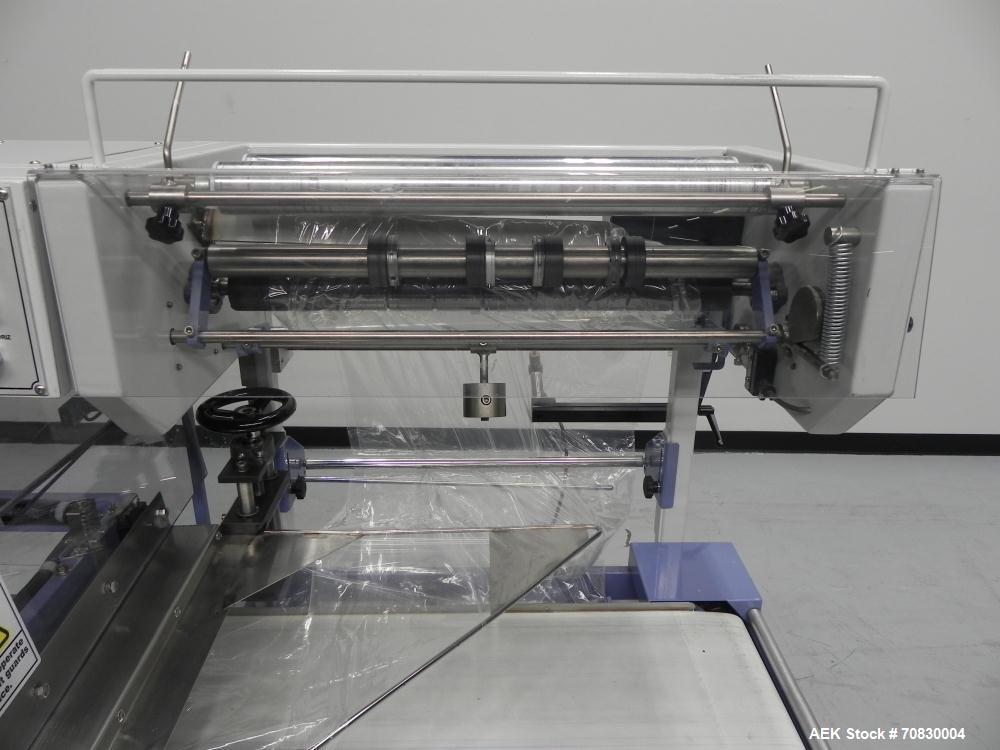 Used Conflex Model E-250 HS Automatic L Bar Sealer and Shrink Wrapper. The model E-250 HS is capable of speeds up to 35 packages per minute. Seal bar is 17" wide x 22" long with max height of 5". Has...