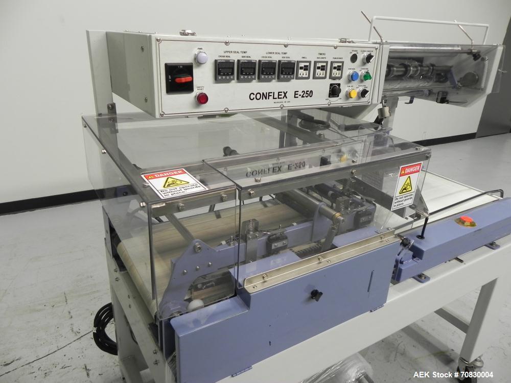 Used Conflex Model E-250 HS Automatic L Bar Sealer and Shrink Wrapper. The model E-250 HS is capable of speeds up to 35 packages per minute. Seal bar is 17" wide x 22" long with max height of 5". Has...