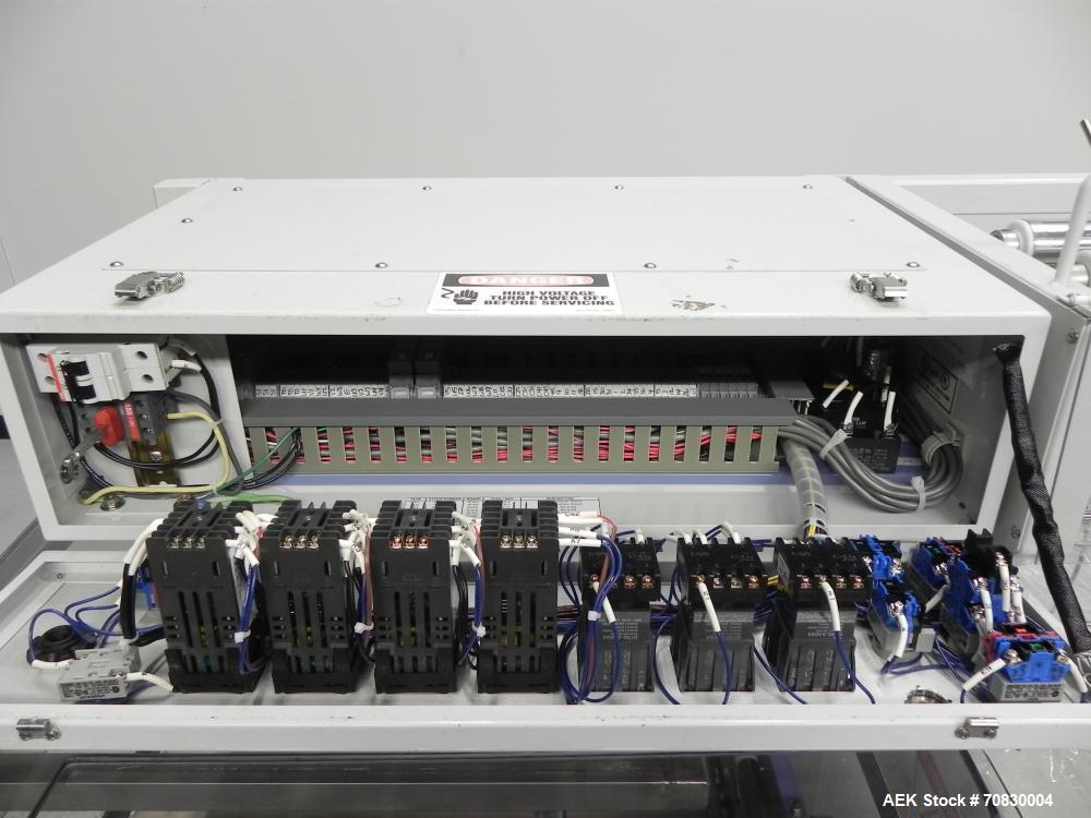 Used Conflex Model E-250 HS Automatic L Bar Sealer and Shrink Wrapper. The model E-250 HS is capable of speeds up to 35 packages per minute. Seal bar is 17" wide x 22" long with max height of 5". Has...