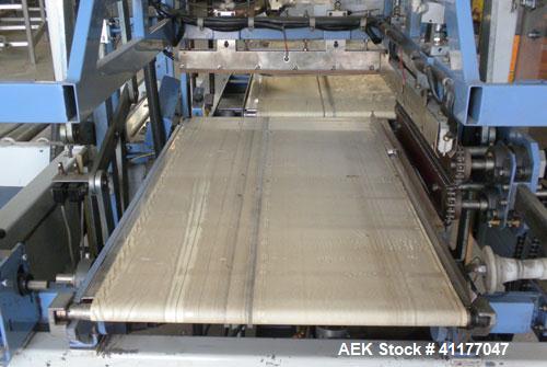 Used Conflex Automatic L Bar Sealer, Model E250 AC. Capable of speeds up to 30 packages per minute, and 100 feet per minute of film. Maximum seal dimensions 19" wide x 24" long x 8" high. Maximum cen...
