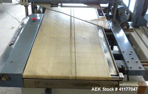 Used Conflex Automatic L Bar Sealer, Model E250 AC. Capable of speeds up to 30 packages per minute, and 100 feet per minute of film. Maximum seal dimensions 19" wide x 24" long x 8" high. Maximum cen...