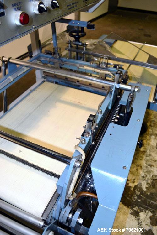 Used Conflex Model E-250C Automatic L Bar Sealer and Shrink Wrapper. Capable of speeds up to 35 packages per minute. Seal bar is 16" wide x 24" long with max height of 8". Has max centerfolded film w...