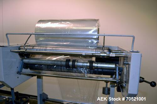 Used Conflex Model E-250C Automatic L Bar Sealer and Shrink Wrapper. Capable of speeds up to 35 packages per minute. Seal bar is 16" wide x 24" long with max height of 8". Has max centerfolded film w...