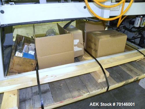 Used Evolution Machinery Automatic L-Bar Sealer and Shrink Tunnel