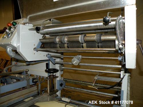 Used Conflex Automatic L Bar Sealer, Model E250 HS. Capable of speeds up to 30 packages per minute, and 100 feet per minute of film. Seal area 17’’ wide x 22’’ long, maximum seal dimensions 15-1/2" w...