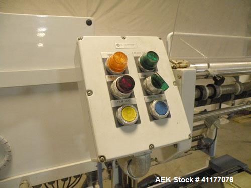 Used Conflex Automatic L Bar Sealer, Model E250 HS. Capable of speeds up to 30 packages per minute, and 100 feet per minute of film. Seal area 17’’ wide x 22’’ long, maximum seal dimensions 15-1/2" w...