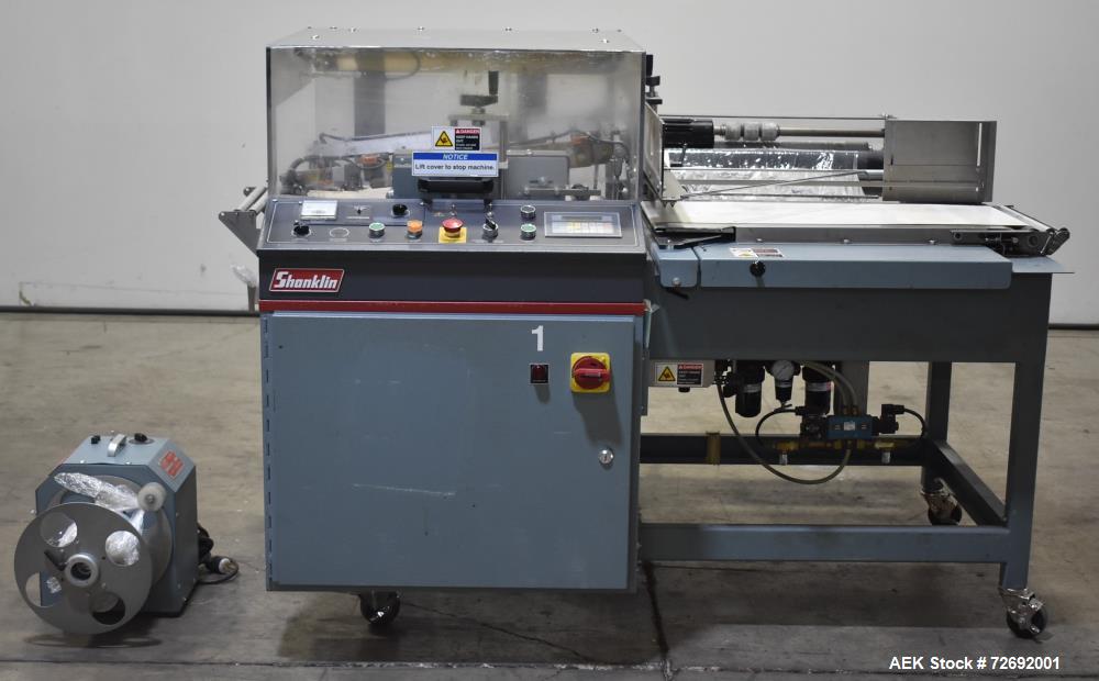 Used- Shanklin Automatic L-Bar Sealer, Model A26A. Capable of speeds up to 35 packages per minute. Has a maximum 24" web wid...