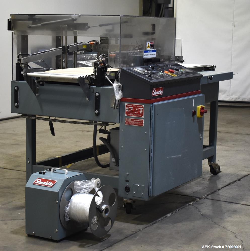 Used- Shanklin Automatic L-Bar Sealer, Model A26A. Capable of speeds up to 35 packages per minute. Has a maximum 24" web wid...