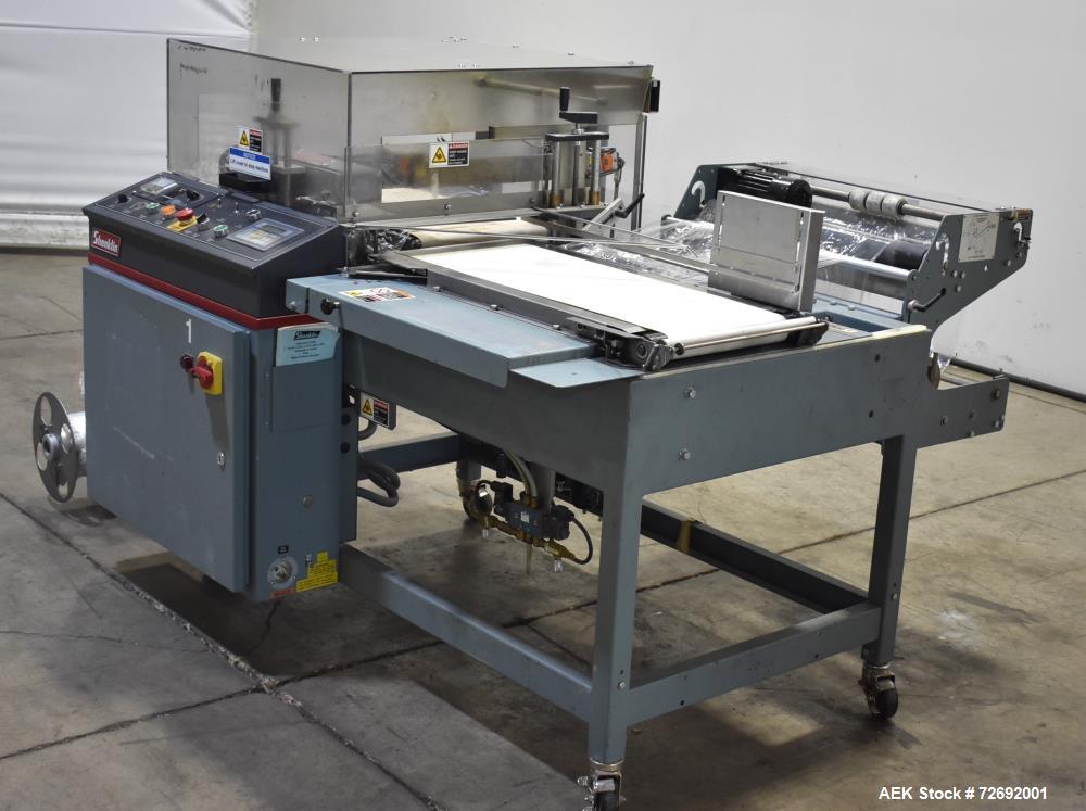 Used- Shanklin Automatic L-Bar Sealer, Model A26A. Capable of speeds up to 35 packages per minute. Has a maximum 24" web wid...