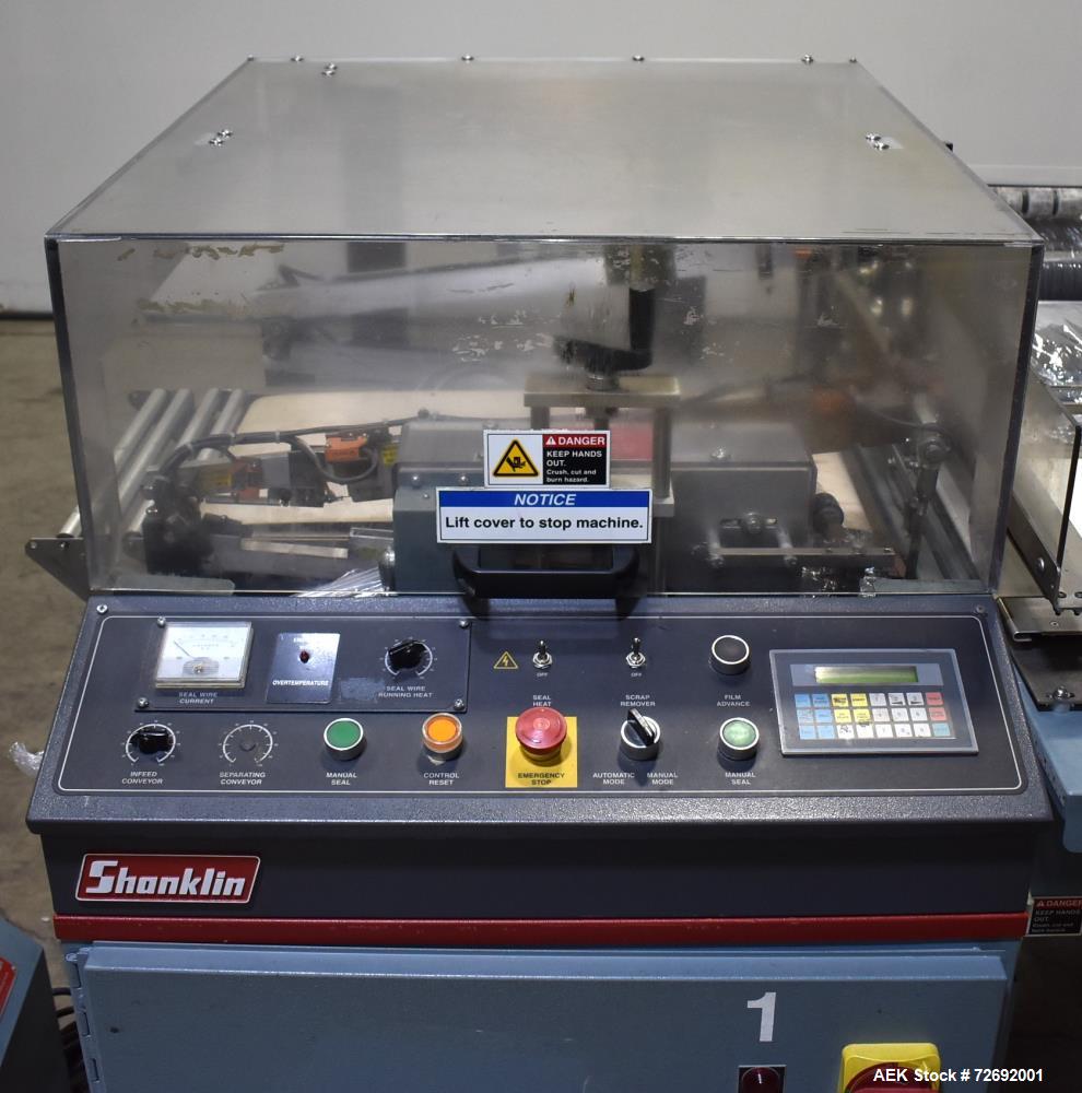 Used- Shanklin Automatic L-Bar Sealer, Model A26A. Capable of speeds up to 35 packages per minute. Has a maximum 24" web wid...