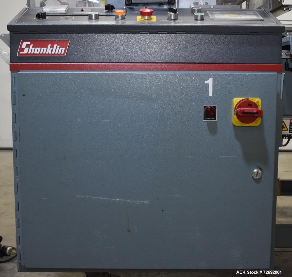 Used- Shanklin Automatic L-Bar Sealer, Model A26A. Capable of speeds up to 35 packages per minute. Has a maximum 24" web wid...