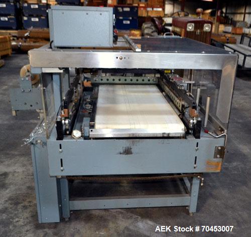 Unused- Shanklin Automatic L Bar Sealer, Model A27A. Capable of speeds up to 35 packages per minute. Has package size range: length 4" to 33", width up to 21", height up to 8". Maximum film size of 3...