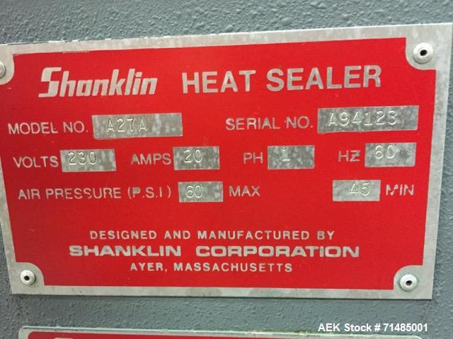 Shanklin automático L barra selladora, modelo A27. Capaz de velocidades de hasta 35 paquetes / minuto. Tiene rango de tamaño...