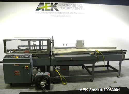 Used ShanklinAutomatic L Bar Sealer, Model A28A. Capable of speeds up to 25 Packages per minute. Seal size 31" wide x 43" long. Has hot knife seal and a package size range: (length) 7-1/2" to 41" (wi...